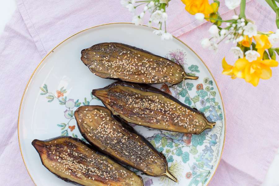 Baked eggplant with tahini cream and chia and sesame seeds