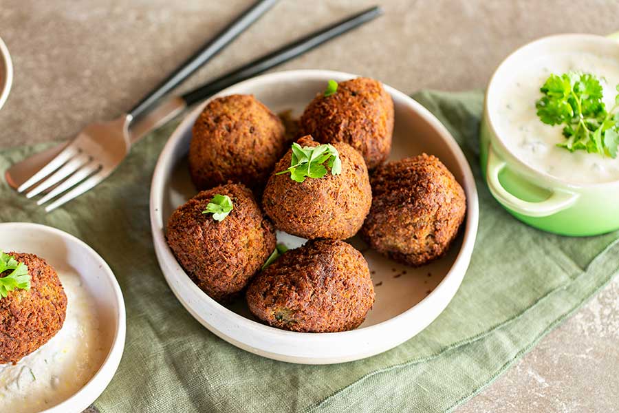 Lentil balls with  spicy yogurt dip