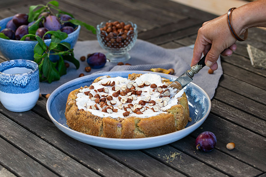 Plum cake with tonka and hazelnuts