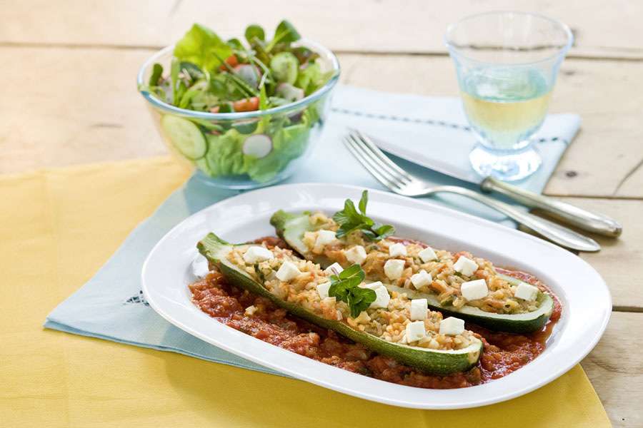 Zucchine con ripieno di noci e riso