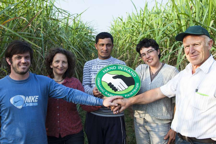Hand in Hand: Barbara Altmann, Director of Raw Material Sourcing Department, (second from left) and Rapunzel founder Joseph Wilhelm (on far right) visit Manduvirá Hand in Hand: Barbara Altmann, Director of Raw Material Sourcing Department, (second from left) and Rapunzel founder Joseph Wilhelm (on far right) visit Manduvirá