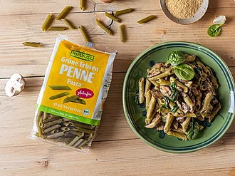 Rapunzel Bio-Spaghetti, einmal in der Verpackung und einmal lose arrangiert – hochwertige Pasta aus kontrolliert ökologischem Anbau