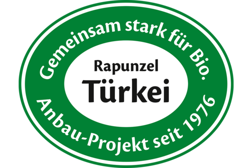Abbildung des Siegels vom Rapunzel Türkei Projekt. Der Text auf dem Siegel lautet "Gemeinsam stark für Bio. Anbau-Projekt seit 1976."
