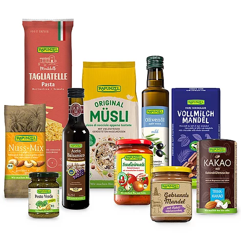 Verschiedene Rapunzel Produkte Verschiedene Rapunzel Produkte vor Geschenkkarton