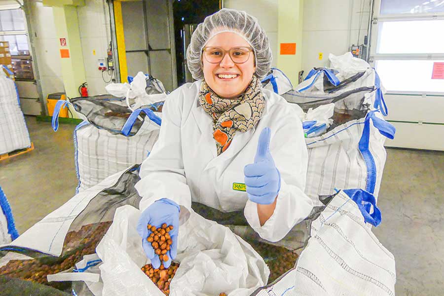 Carolin from Rapunzel's quality assurance team is pleased about the high quality hazelnuts.