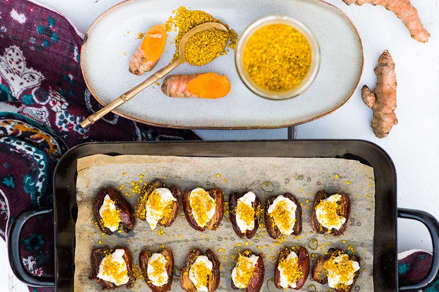 Stuffed dates with orange cream cheese, gomasio and turmeric