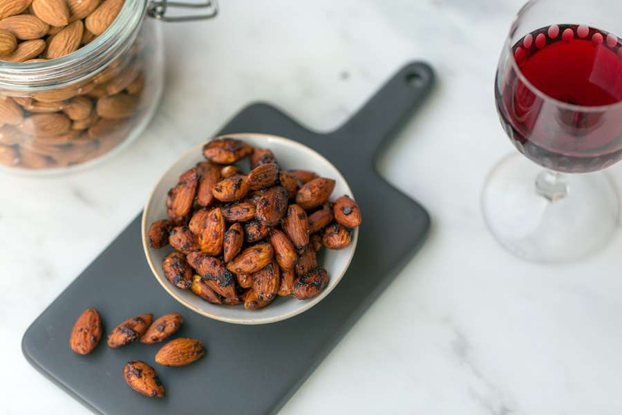 Roasted almonds with coconut blossom syrup and yeast flakes