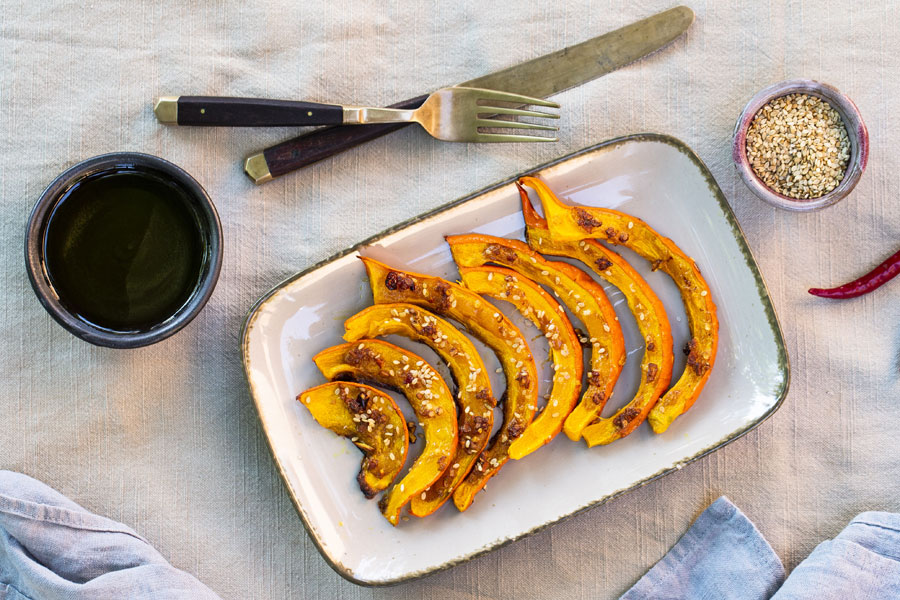 Hokkaido pumpkin wedges with soy sauce and sesame