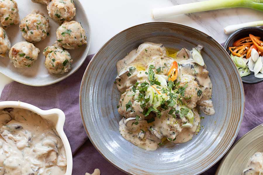 Bread dumplings in cashew mushroom cream sauce, vegan